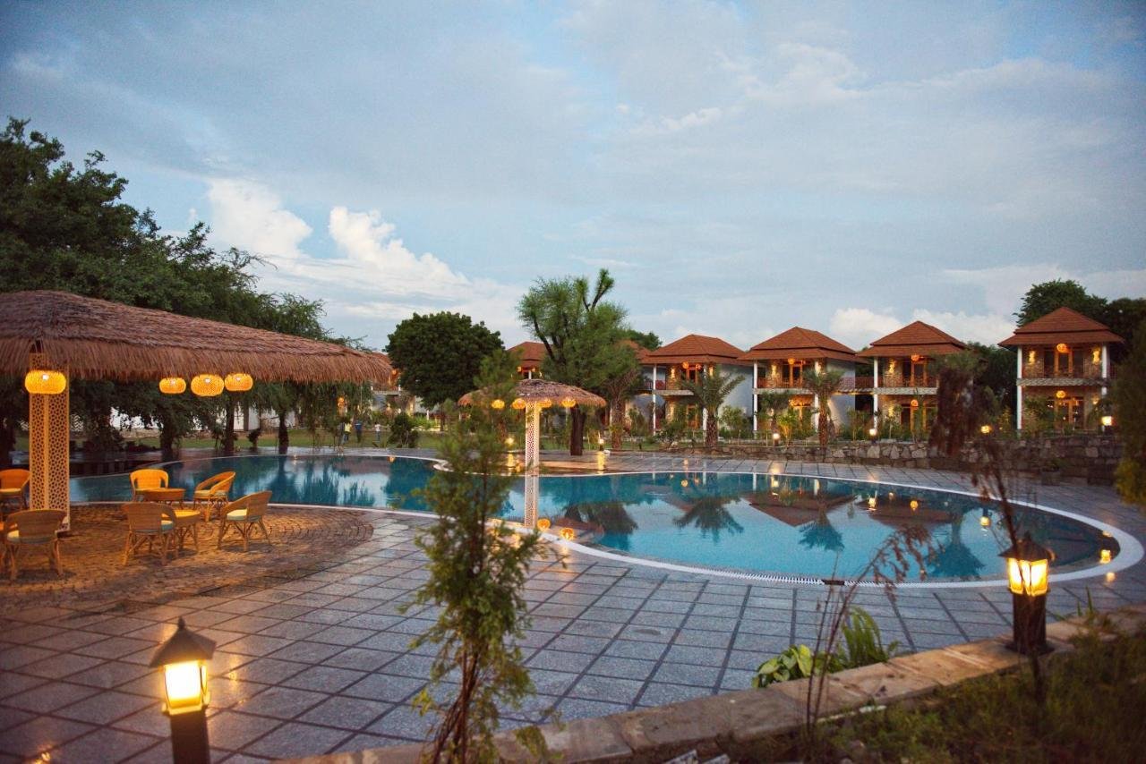 Resort pool lit up at night